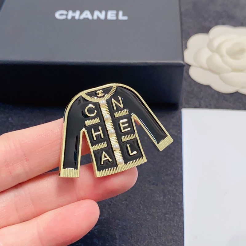 Ch**el brooches
